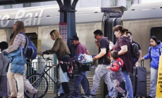 Commuters try public transit after fire closes 10 freeway