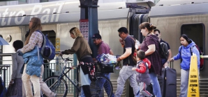 Commuters try public transit after fire closes 10 freeway