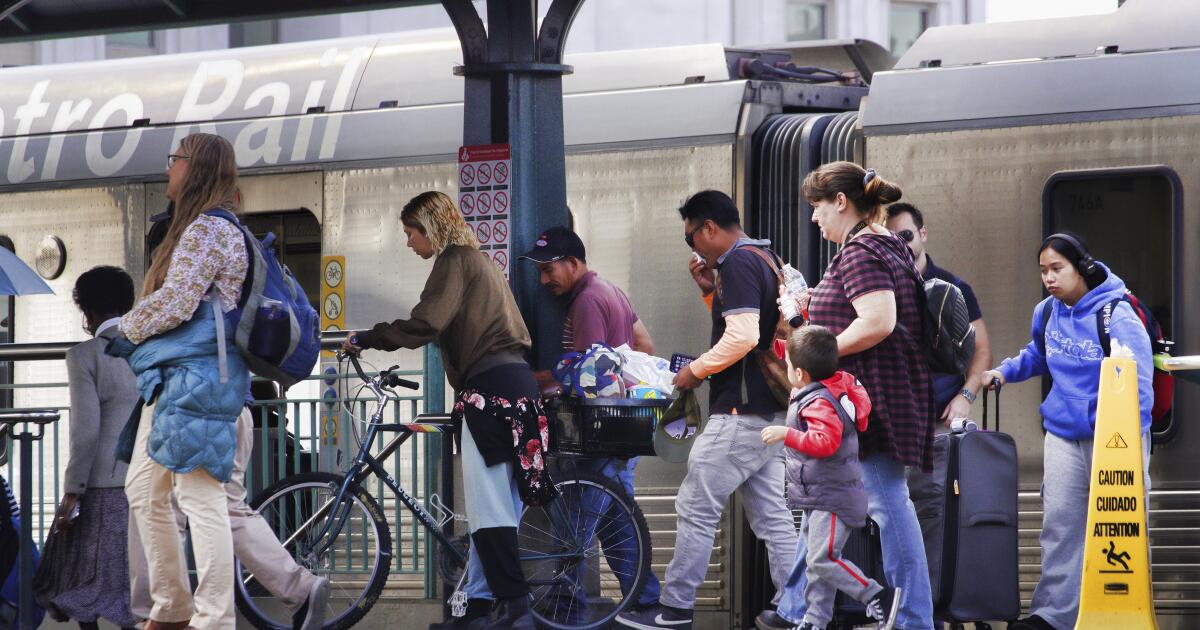 Commuters try public transit after fire closes 10 freeway